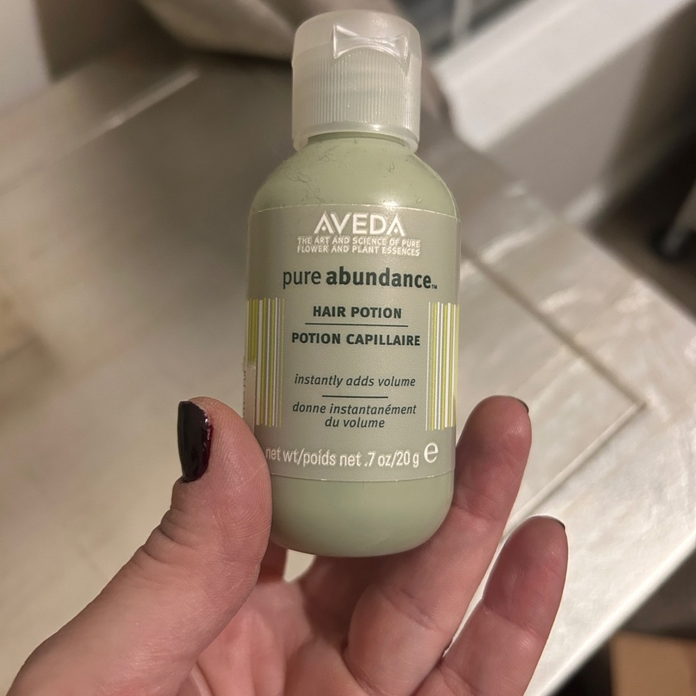 AVEDA Pure Abundance Hair Potion in Light Green